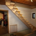 Escalier quart tournant limon central et garde corps déstructuré