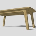 Une grande table en noyer tout en courbe