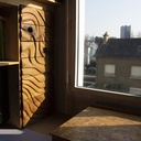 Meuble de bureau, façade en chêne sculptée.