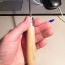 Opinel avec manche en olivier et dragonne