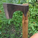 Travail du manche au vastringue pour l'adapter au fer de hache