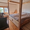 Lit baldaquin en vieux bois