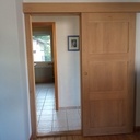 Porte coulissante en chêne