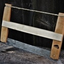 Petite scie à araser.