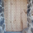 Porte cloutée à lames croisées