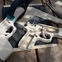 Pistolets à élastiques chantournés