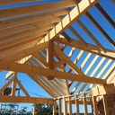 Ossature bois avec noue de charpente et ferme apparente