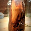 Lampe en loupe de noyer noir.