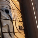 Meuble de bureau, façade en chêne sculptée.