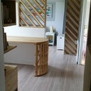 Agencement sur-mesure mélèze à claire-voie