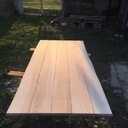 Plateau de table et sa finition faite par son propriétaire