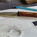 Manche en bois d'un couteau et coquetier