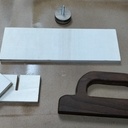 Poussoir de sécurité avec talon ajustable et remplaçable