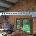 J'aspire à moins de poussière dans l'atelier.