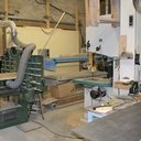 degau ponceuse et scie a ruban dans l'ombre une alternax et une mortaiseuse a chaine