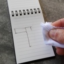 Des cahiers avec des feuilles de papiers réutilisables