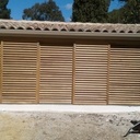 Enjoliveur de compresseur de clim et porte coulissante pool house