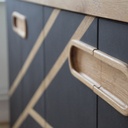 Un meuble avec poignée sur mesure