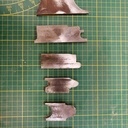 Fer a toupie ( de haut en bas) jet d'eau; moulure traverse intermédiaire du dormant; gorge d'évacuation de la traverse basse dormant; noix et contre noix; mouton et gueule de loup; moulure