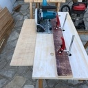 Un guide équerre symétrique pour scie circulaire