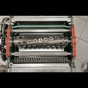 Montage d'un arbre hélicoïdale à plaquettes carbures sur une Kity 636