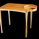 Bureau en merisier incrusté d'ébène, pieds gainés en quart de tour torsadés et cassetin