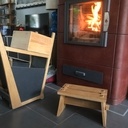 Tabouret pour remplir le poêle à bois.
