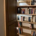 Habillage mur façon bibliothèque