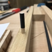 Réduction de la base pour l'insertion dans les tasseaux en padouk