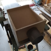 La boite d'aspiration dégauchisseuse à sa place avant installation.