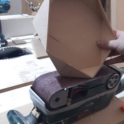 Arasement final à la ponceuse à bande