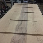 Traverse bloquées dans des rainures pour limiter le tuilage