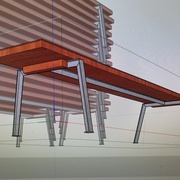 On voit sur cette image le bancs version "deluxe" : barre de renfort centrale et supports bois pour emplier les bancs sans faire de marque.