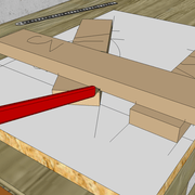 **4/** Nous piquons sur les champs du montant avec de petit traits, les arêtes des champs de traverses .