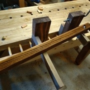 un boulon et écrou papillon d'un coté plus qu'à faire l'autre coté