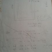 feuille de débit et plan sur le coin de l'établi
