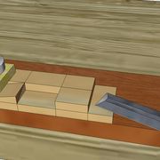 **ENTAILLE N° 4 :** Finition du plat de l'entaille au ciseau avec la planche en coupe fauchante .