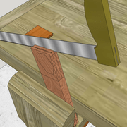 **d/** Apres retournement de la pièce, nous descendons la joue complète, en se laissant guider par le premier sciage de façon horizontale .