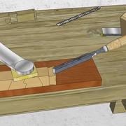 **5c/**Nous entaillons au ciseau les joues moitié de trait des tracés.