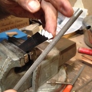 façonnage d'un fer de cimaise