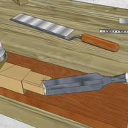 **5b/**Nous finissons ensuite les queues d'aronde au ciseau .