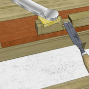 **5a/** Nous exécutons les entaillages femelles des montants.