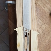 Deux moitiés et la lame