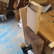 raccourci dans les 2 sens à la scie à dos à 1 mm de "l'objectif"