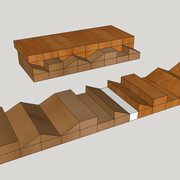 Pièce monoxyle taillée et pièce finie après sciage de séparation