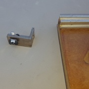 Équerre de butée qui coulisse dans le rail alu 20x20