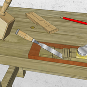 **5/** Au ciseaux à bois et maillet/main nous bûchons précisément l'entaille secondaire.