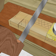 **3/** Exécution du second trait de scie.