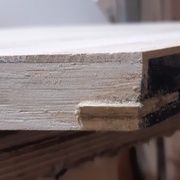 tentative de boucher les rainures à l'avant de la porte coulissante