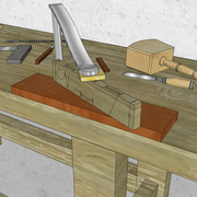 **Installation sur l'établi d'une pièce à mortaiser à la main :**